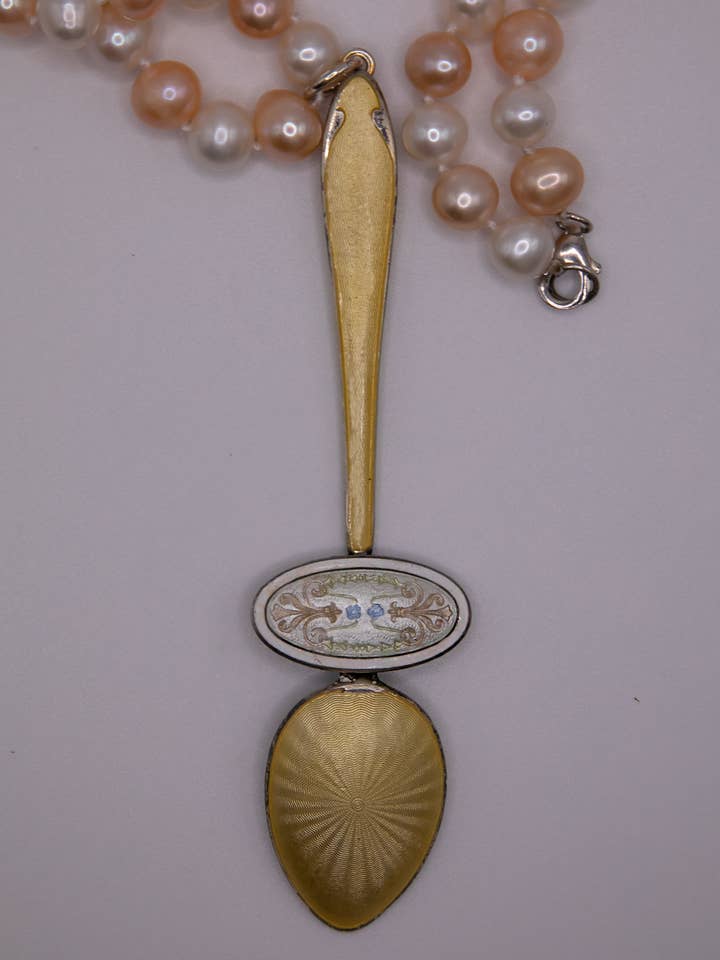 Yellow spoon with antique sterling brooch and pearls.
for wholesale by DecoFiniti LLC