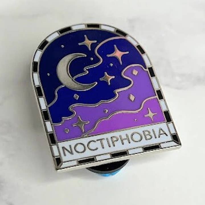 Noctiphobia Enamel Pin for wholesale by Triclops Rabbit