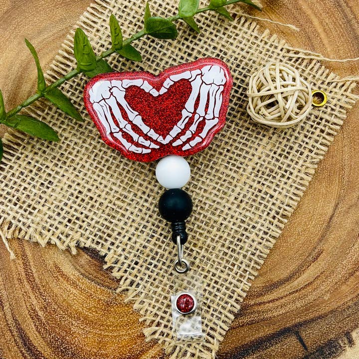 Skeleton Heart Glitter Badge Reel por atacado de Velaris Wood and Vinyl
