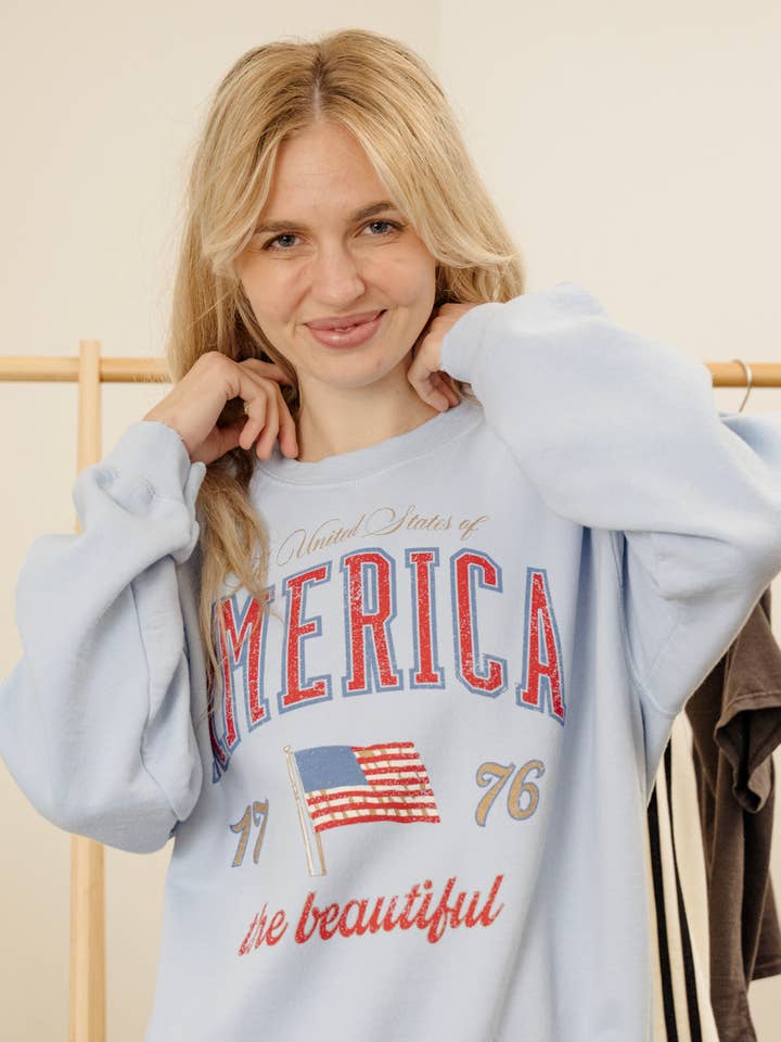 4th of July America USA Wave Arch Blue Thrifted Sweatshirt for wholesale by LivyLu