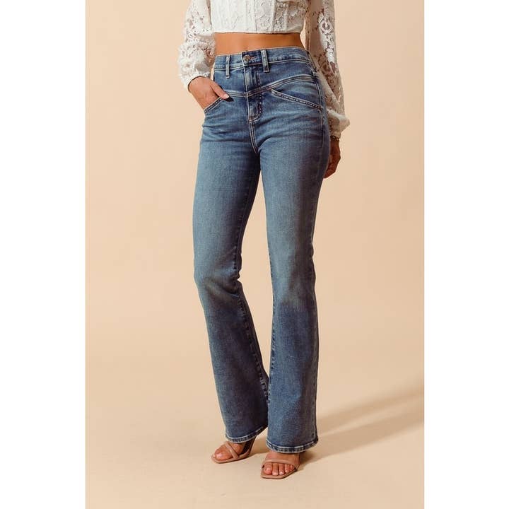DENIM MID RISE YOKE CUT FLARE BOTTOM LONG LENGTH JEANS for wholesale on Faire