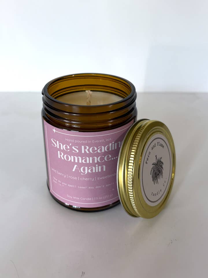She's Reading Romance... Again Candle for wholesale by Fern and Flame Candle Co.