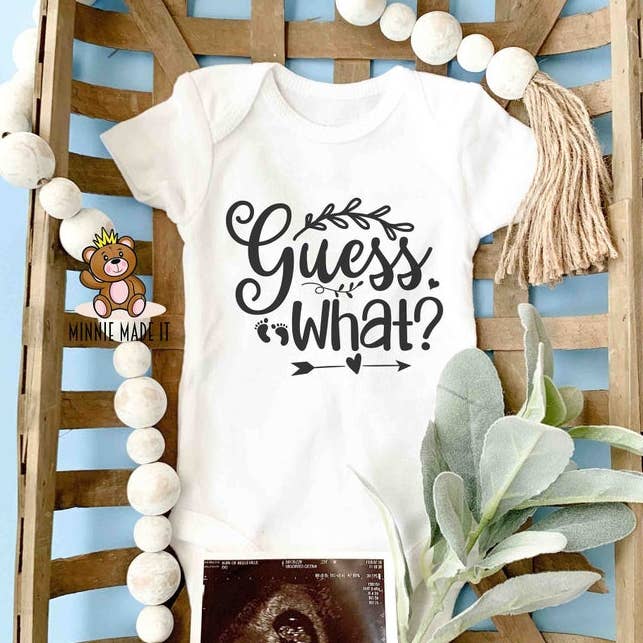 Guess What? Baby Onesie for wholesale by Minnie Made It