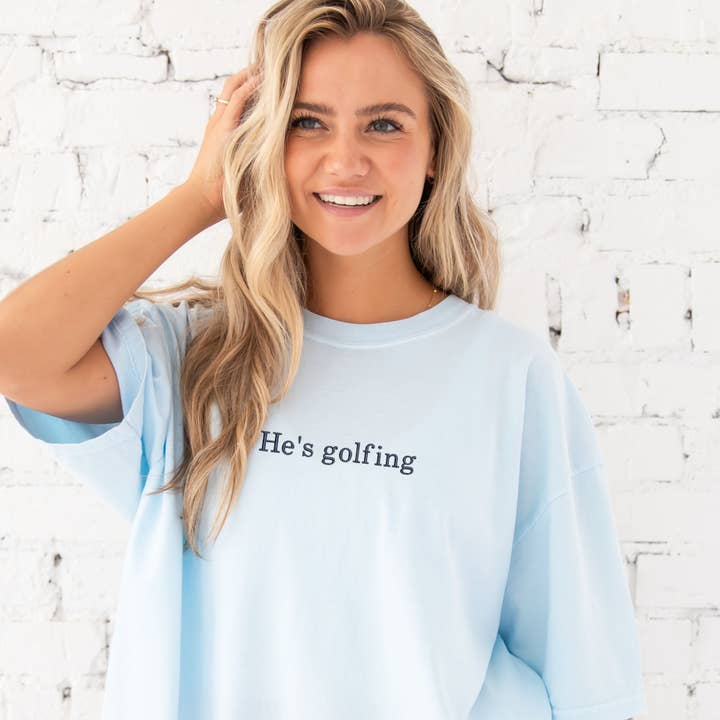 Arden & Gold - Wholesale T-Shirt - Women's - He's Golfing/I'd Rather Be Golfing Embroidered Comfort Colors Tee
