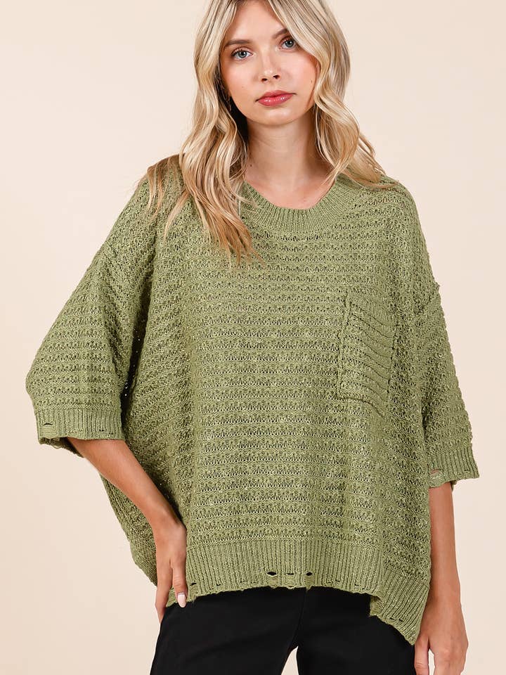 KURZÄRMLIGES, LOCKERES PULLOVER-STRICKOBERTEIL MIT USED-SAUM für den Großhandel von mittoshop