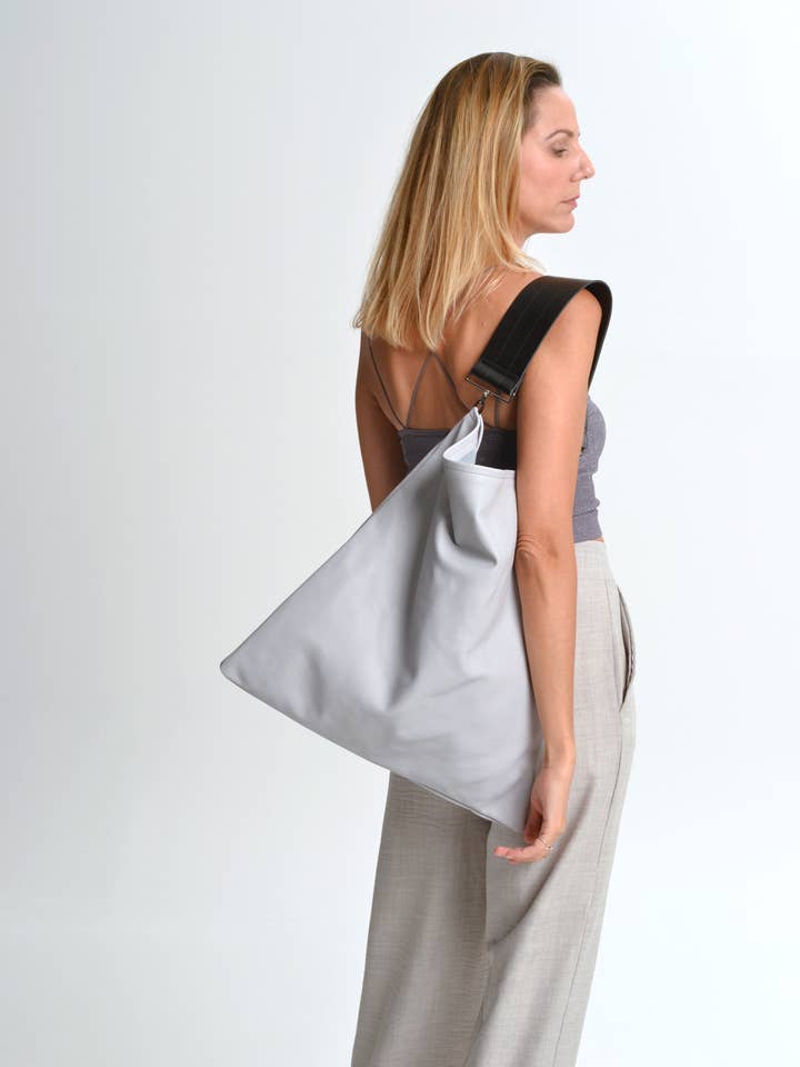 Akathi leather bag in light gray for wholesale by ANA KOUTSI
