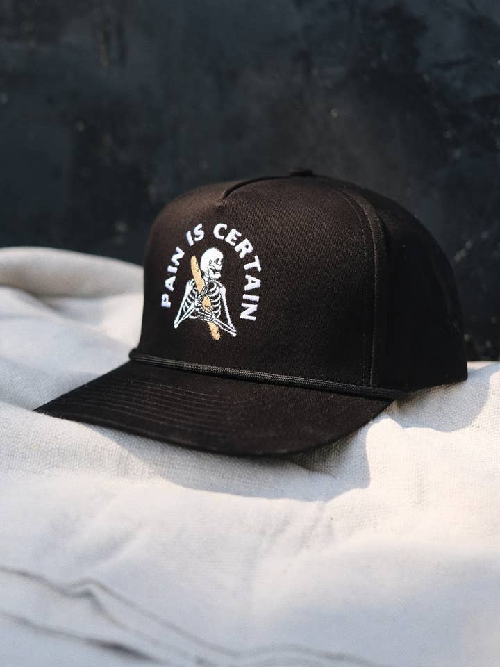 Pain is Certain Hat for wholesale by Pyknic
