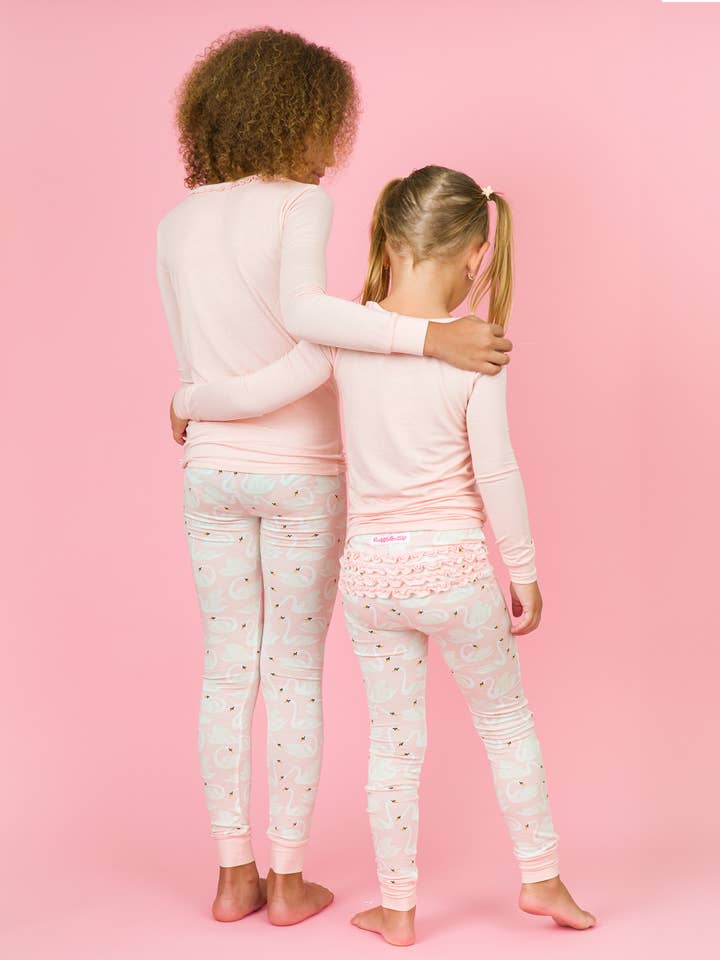Pink Toddler Girls Swan Lake Dream Bamboo Viscose Ruffle Long Sleeve Pajama Set
for wholesale on Faire