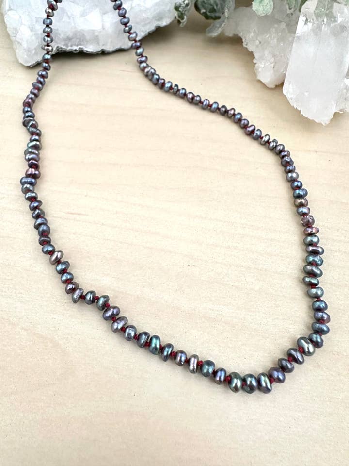 Dark Pearl Strand Hand knotted on Red Silk for wholesale by Pyrite and Pearls