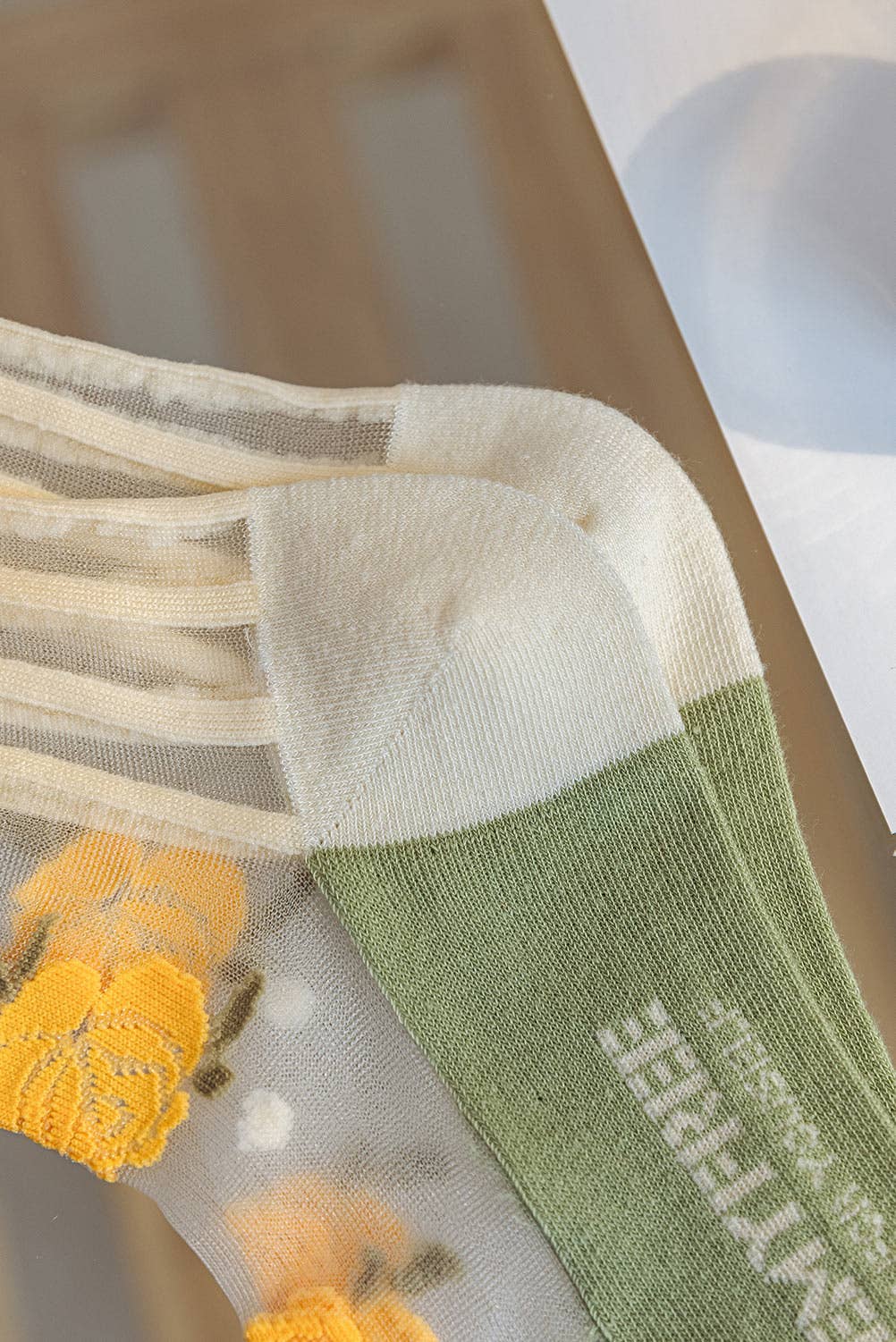 Orange 🧡🌼 Transparent Stockings with Embroidered Flowers 🌼 for wholesale on Faire3