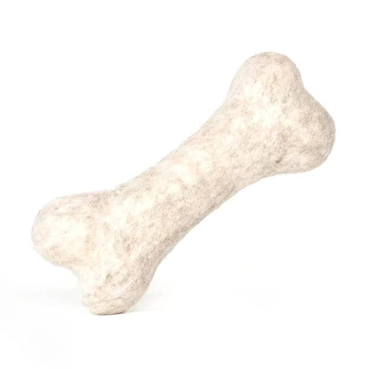 BUDDY. Dog toy made of sheep wool "Bone" and other Purchase Wholesale knappar. Free Returns & Net 60 Terms on Faire trending on Faire.