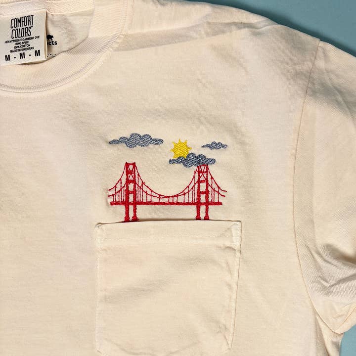 Animal Instincts - Wholesale T-Shirt - Unisex - San Francisco Bridge Embroidered Unisex Pocket Tee