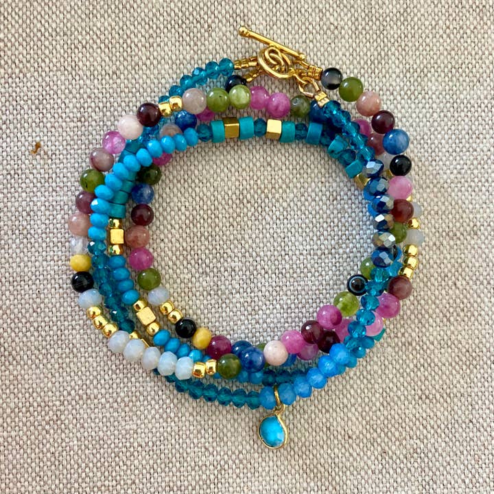 MANTRA BEADS BRACELET - PURPLE "RELEASE" per la vendita all'ingrosso da parte di VICTORIA DENY JEWELRY