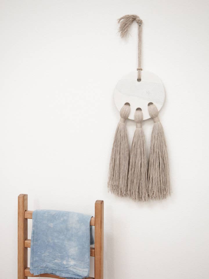 Glyph Wall Sculpture - Sol W/ Fringe for wholesale by Fanny Penny