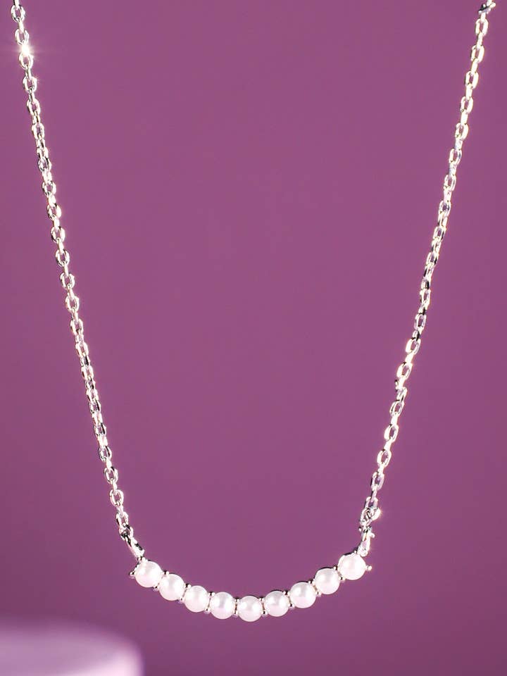 Brass Pearl Pave Curve Pendant Necklace for wholesale by Urbanista