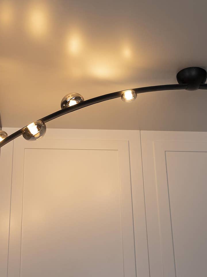 Sottopiatto in pelle nera di Kinshasa con quattro vetri fumé per la vendita all'ingrosso da parte di HEKA LIGHTING & TRADING LTD