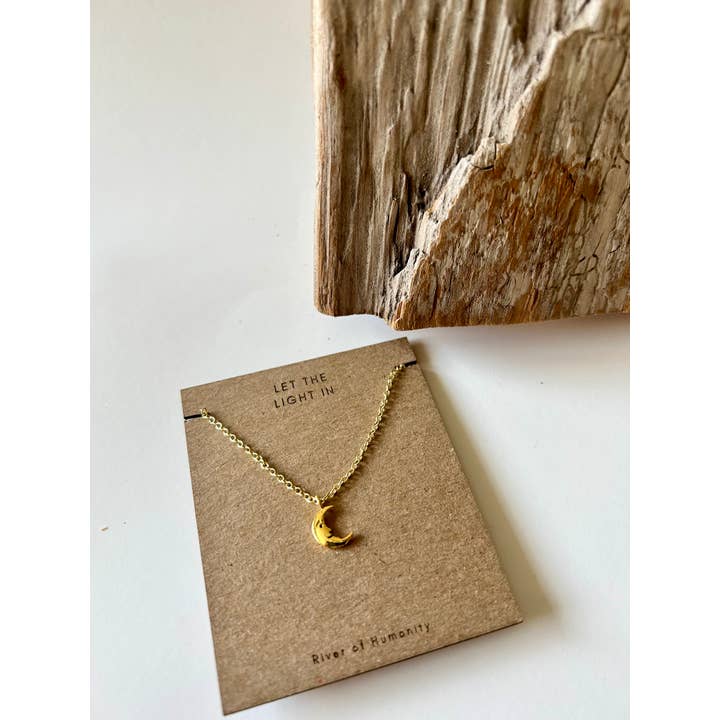 Mini Crescent Moon Gold Plated Brass Necklace for wholesale by River Of Humanity