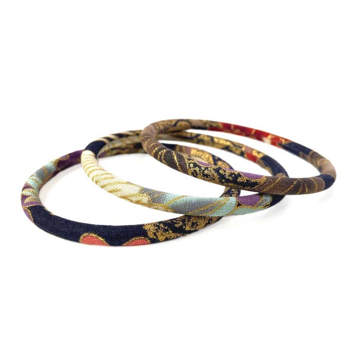 Melokane – wholesale Bangle bracelet – Japanese gold bangle bracelet - flowers and cranes on a black background