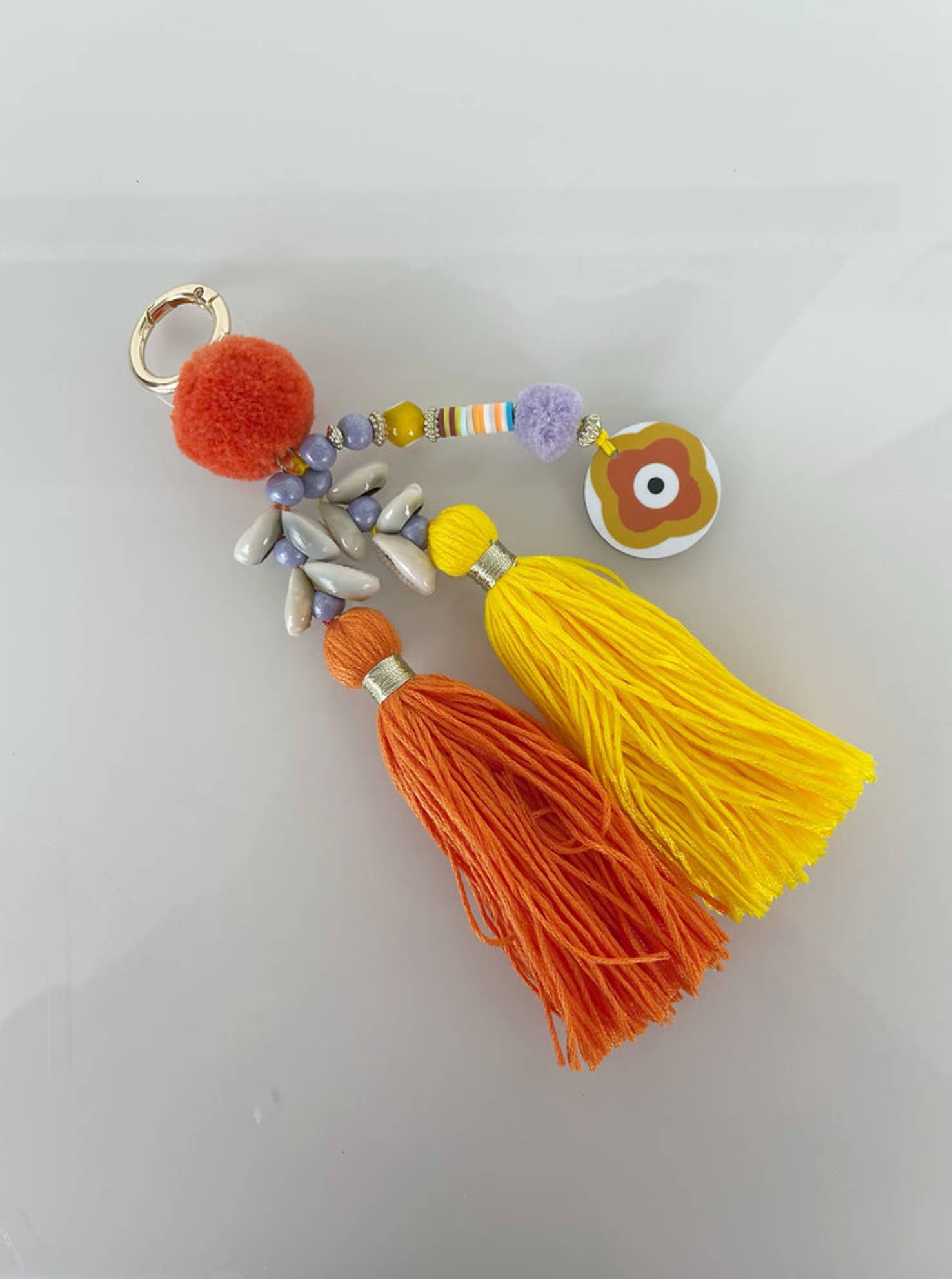 Liviana Lisbon - Wholesale Purse/Bag Accessory - Women's - BAG CHARM GRIGRI ORANGE POMPOM