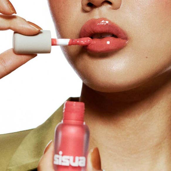 Strawberry Cream UNLEASHIA Sisua Popcorn Syrup Lip Plumper for wholesale on Faire0