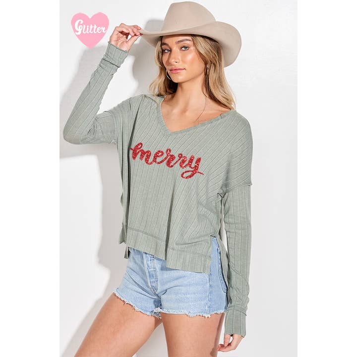 Top a maniche lunghe con spacco laterale con stampa glitterata Merry per la vendita all'ingrosso da parte di Phil Love