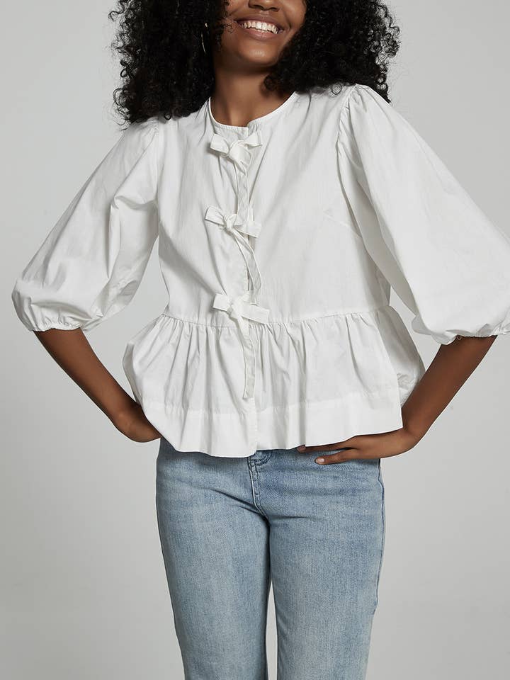 White Elowyn bow tie front round neck Bubble puff sleeve blouse for wholesale on Faire