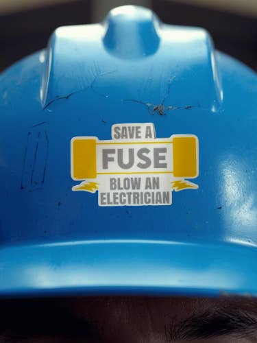 Blow an electrician sticker for wholesale by Brinnvill Books