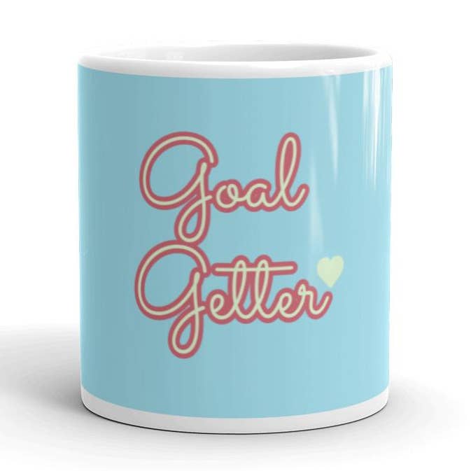 Tazza blu Goal Getter per la vendita all'ingrosso da parte di Caffeine-Queens LLC