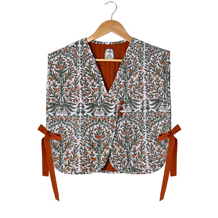 Quiltad vändbar väst med knytning i sidan för wholesale av Lozee