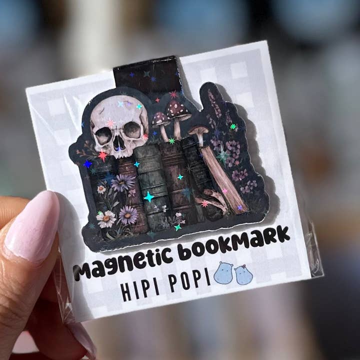 Crâne sur des livres pour la vente par Hipi Popi