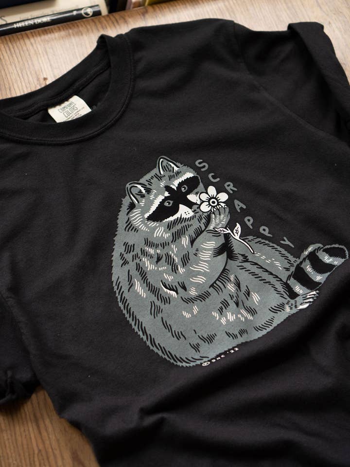 Black Scrappy Raccoon T-Shirt for wholesale on Faire