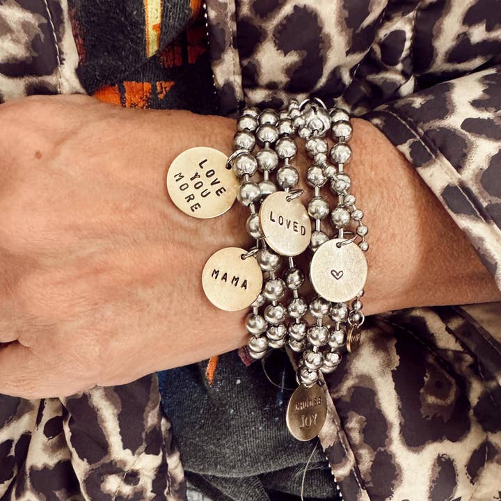 Personalized Stainless Steel & Brass Coin Tag Bracelets and other Purchase Wholesale personalized wristbands. Free Returns & Net 60 Terms on Faire trending on Faire.