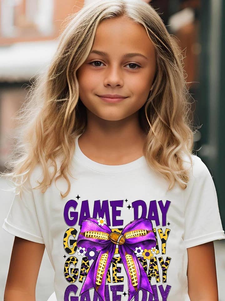 Purple Yellow Football Game Day Bow Kids Tee for wholesale by Pink Irene Wholesale