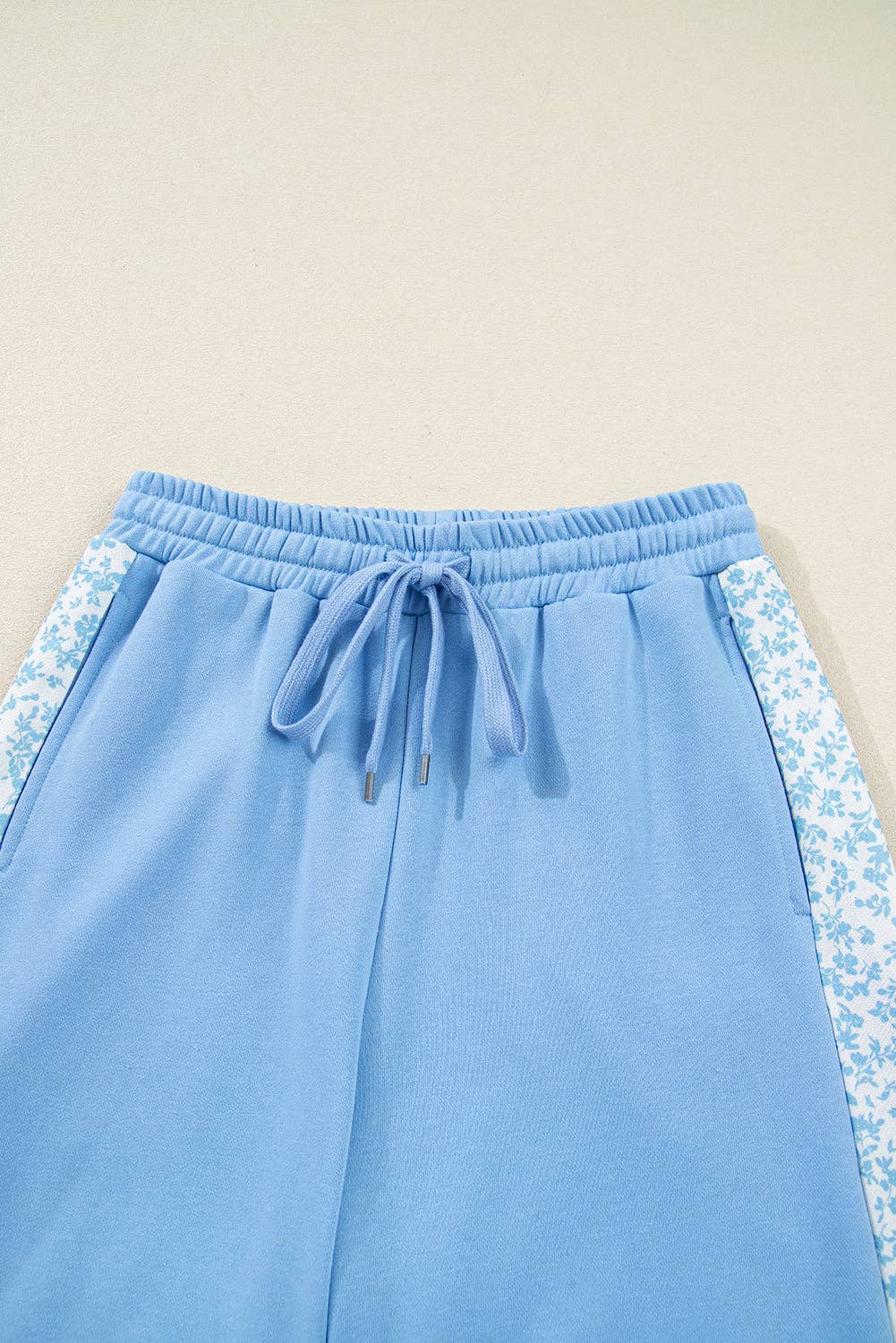 Beau Blue Floral Patchwork Pullover and Sweatpants Lounge Set for wholesale on Faire7