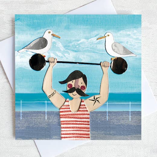 Seaside Strongman Kusthälsningskort för wholesale av Joanne Wishart