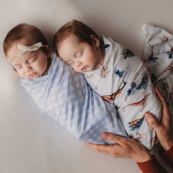 Ocean Jersey Swaddle Stretch Wrap & Beanie for wholesale by SNUGGLY JACKS