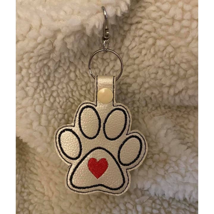 Paw Keychain, Paw Print Key Chain, Pet Snap Tab Key Fob, Paw Print Tag, Dog Paw Key Chain and other Purchase Wholesale paw print keychain. Free Returns & Net 60 Terms on Faire trending on Faire.