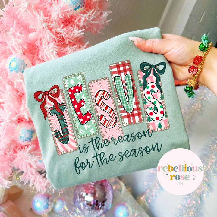 Jesus Stamps Christmas Graphic T-shirt for wholesale by Rebellious Rose LLC