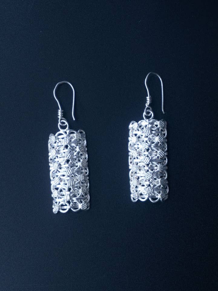 orecchini pendenti in argento wolof per la vendita all'ingrosso da parte di Fulaba