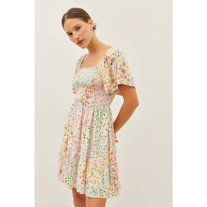 FLOWY RAYON GAUZE SMOCKED DITSY FLORAL MINI DRESS for wholesale on Faire