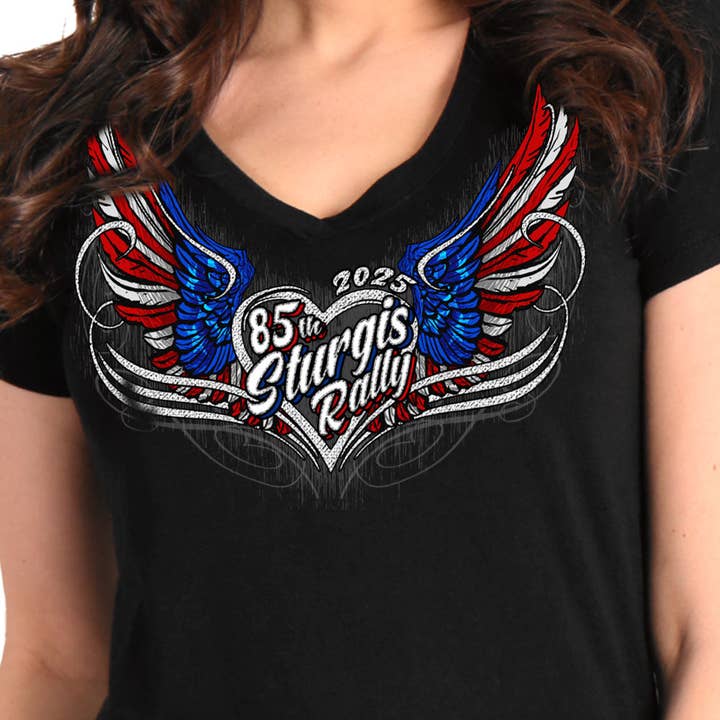 2025 Sturgis Motorcycle Rally Flag Heart Angel Black Ladies Tee for wholesale on Faire