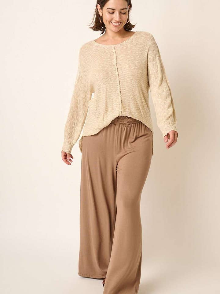 PLUS STRIKKEDE BUKSER MED BREDE BEN MED SMOCHET TALJE for engroshandel hos mittoshop