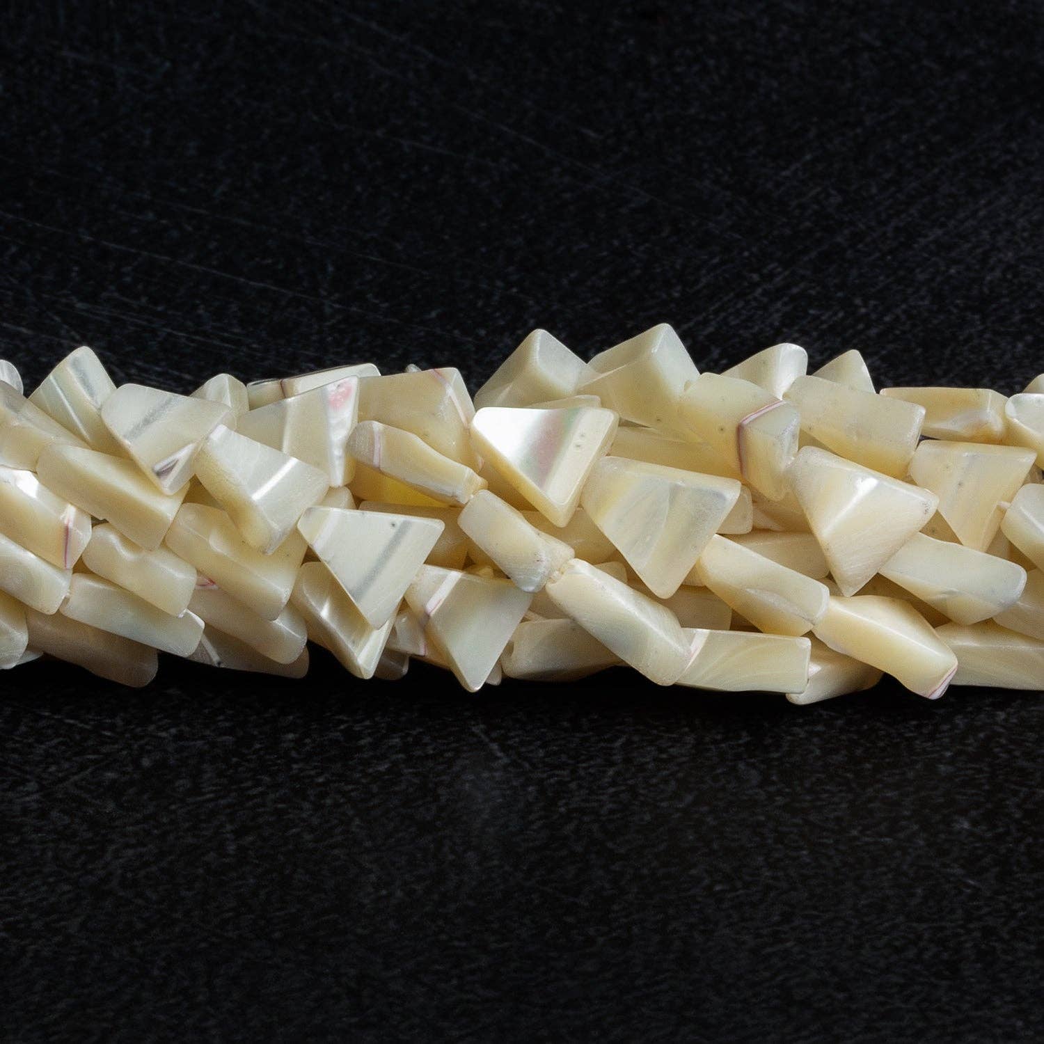 The Bead Traders - Wholesale Beads - 8-10mm Mother of Pearl Plain Triangles 12 inch 40 beads0