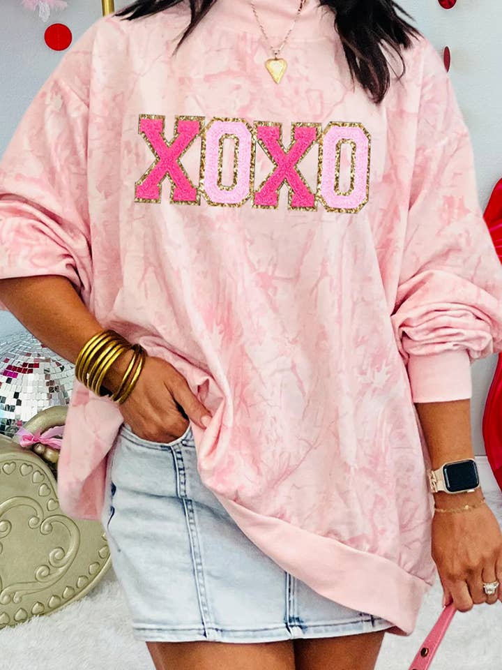 XOXO Glitter Trim Patched Graphic Tie Dye Sweatshirt (S-XL) for wholesale by 66DISCO