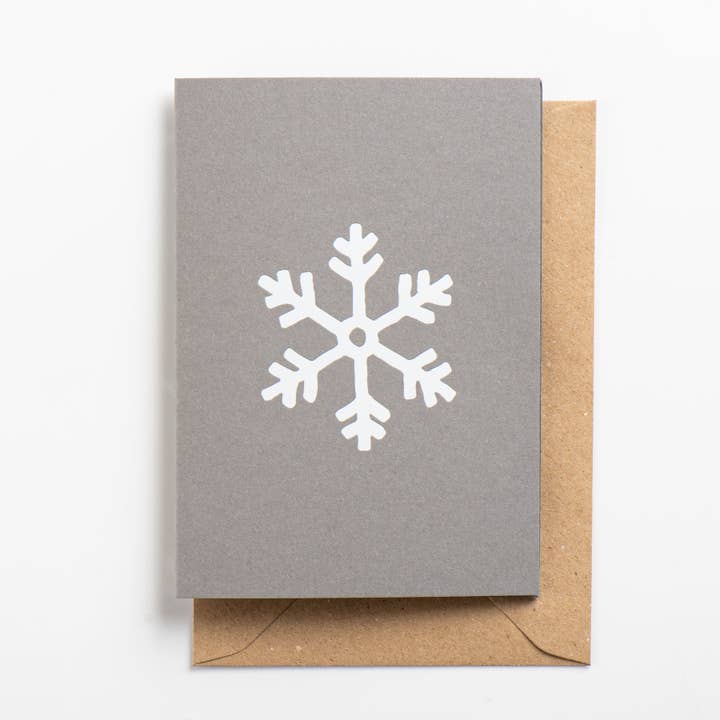 Biglietto con fiocco di neve, bianco lucido su pietra focaia per la vendita all'ingrosso da parte di Osity