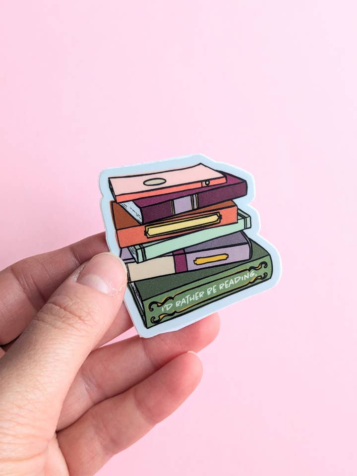 I'd Rather Be Reading Stack of Books Vinyl Sticker for wholesale by Laura Jane Kirton