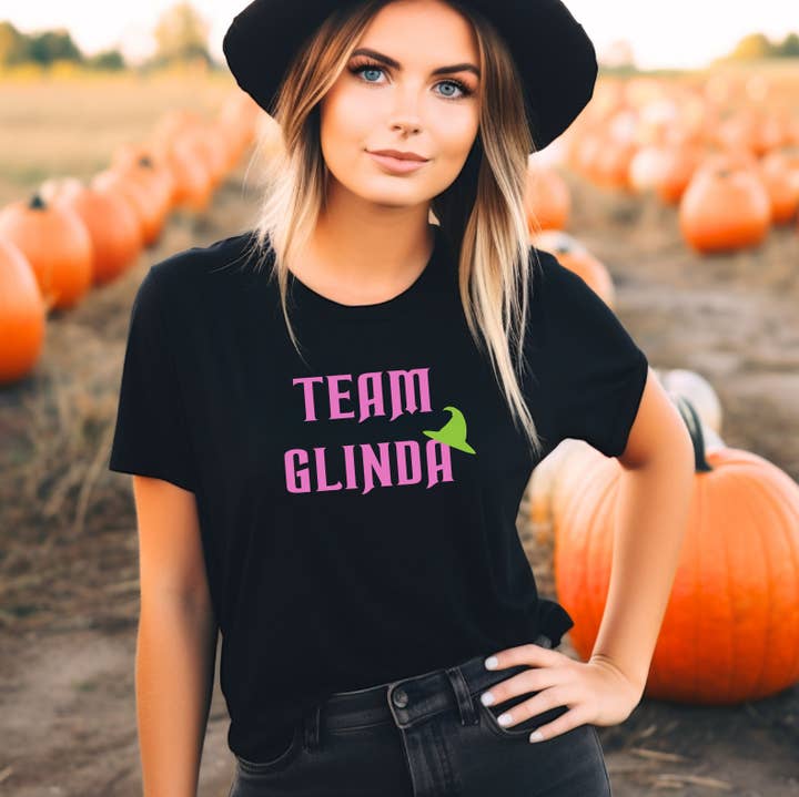 Team Elphaba Team Glinda Wicked inspired Graphic Tee for wholesale by Scenic Trends