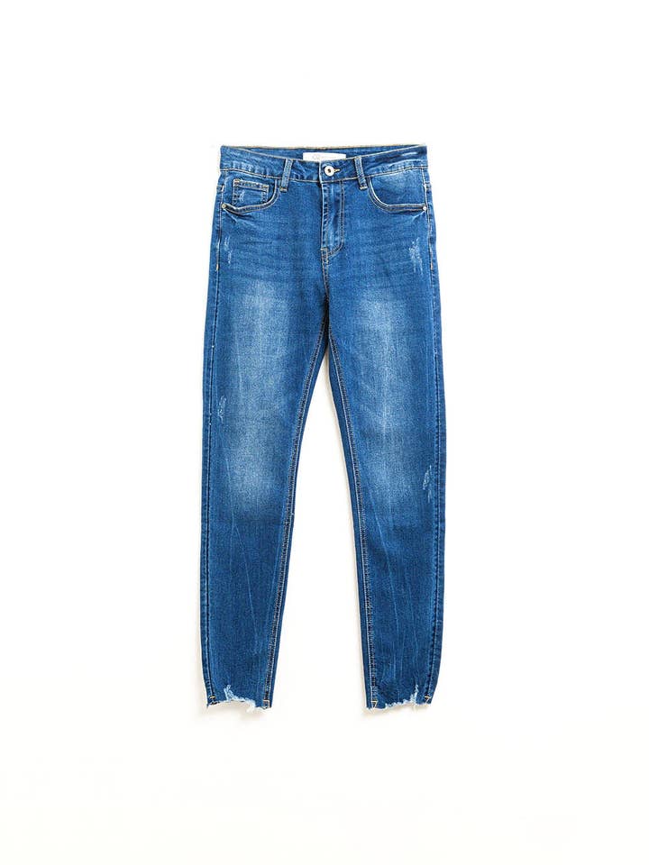 Super skinny jeans in medium wash with rips at the bottom for wholesale by Q2—All Orders:Free Duties for the US,UK,and Canada