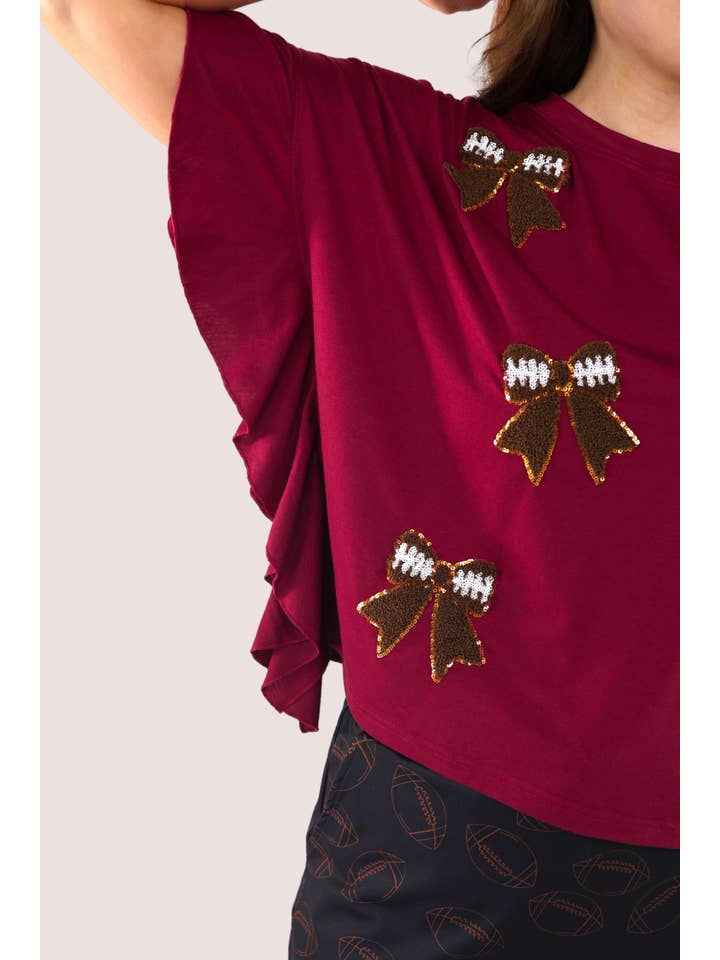 Sideline Sparkle Ruffle Top- Maroon for wholesale on Faire6