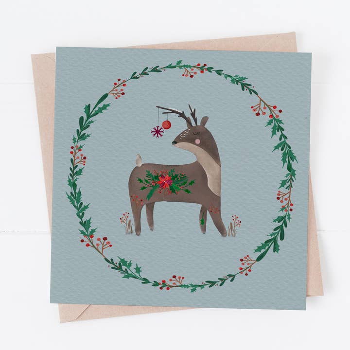 Reindeer with Wreath, Christmas card for wholesale by AmTheo Art Designs
